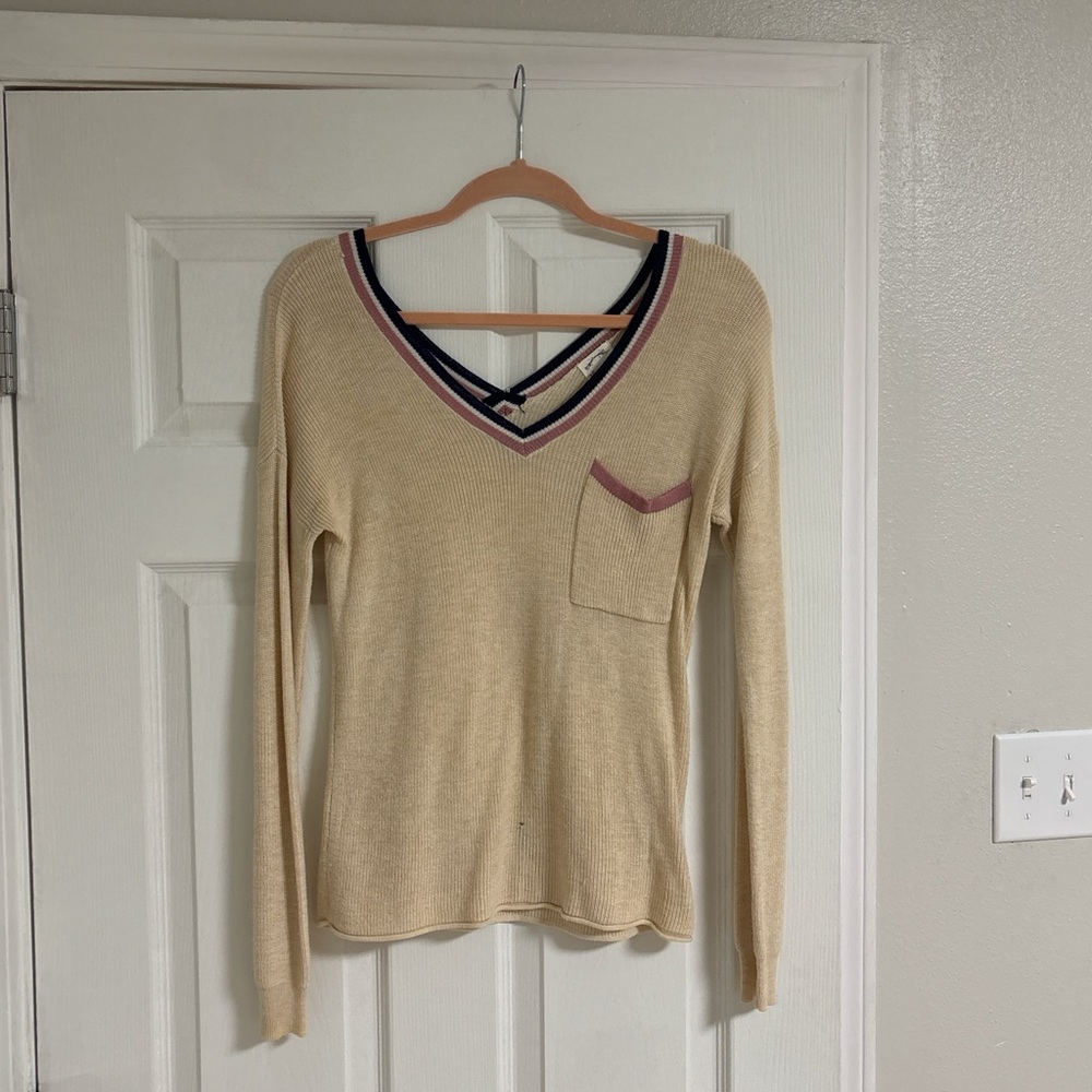 Tan and pink V-neck sweater